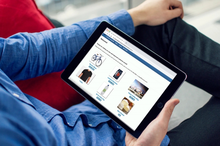 Bizowie Cloud B2B Portal on a laptop